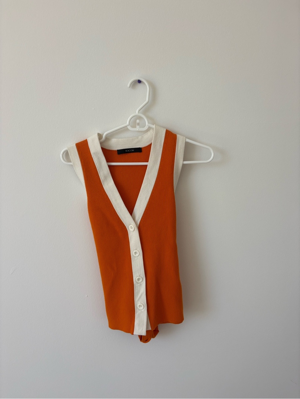 Toccin Sleeveless Orange Knit Bodysuit with Cream Trim